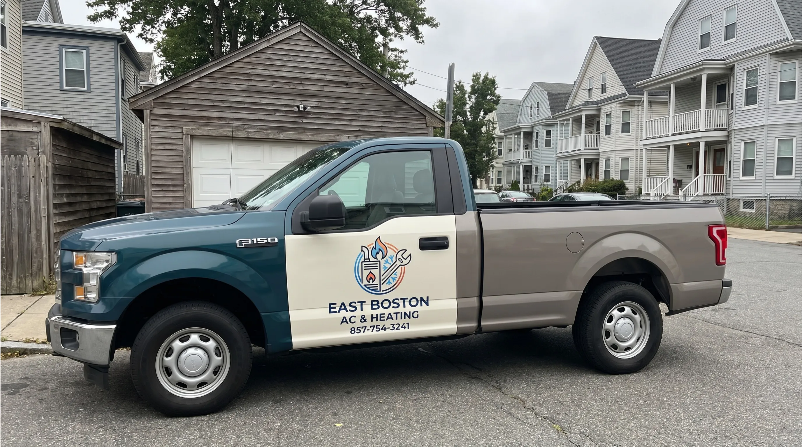 HVAC technician servicing an air conditioning unit in Boston, MA